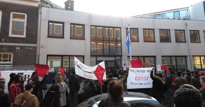 In front of the immigration department office, right next to the police office so that refused refugees can be deported efficiently.