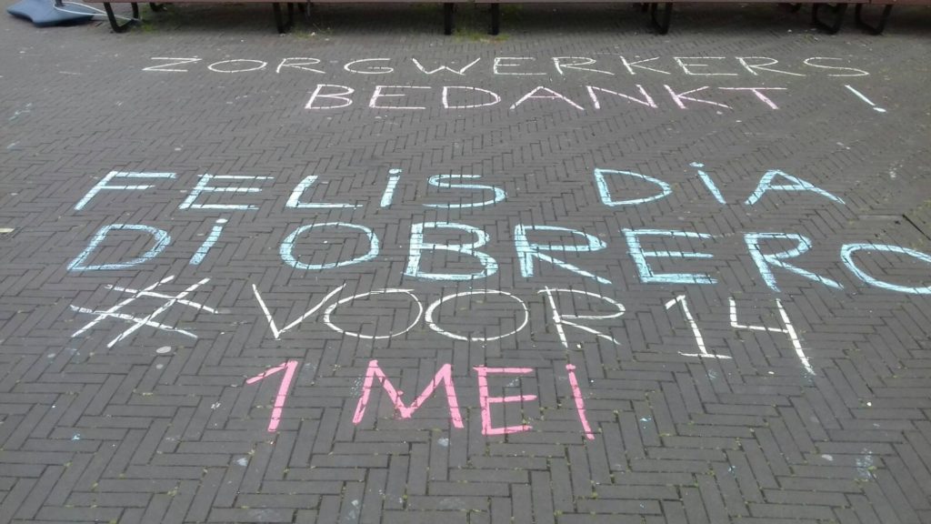 Krijttekst: "Felis día di obrero #voor14 1 mei"