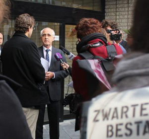 Students present the chancellor of the University of Utrecht with a petition against blackface.