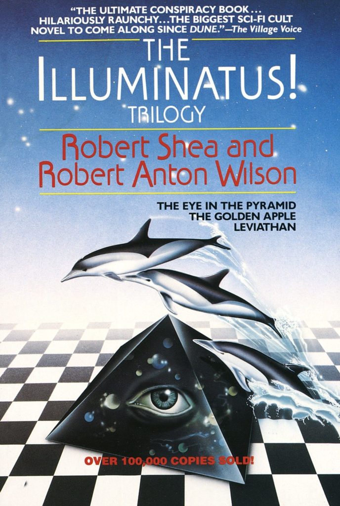 De omslag van het boek 
 The Illuminatus Trilogy" van Robert Shae en Robert Anton Wilson. De stijl van de omslag (een herdruk) doet erg jaren 80 aan. Een dambordpatroon met daarop een zwarte piramide met een oog erop. Er springen drie dolfijnen over de piramide heen. Onderaan staat "Over 100,000 copies sold!".